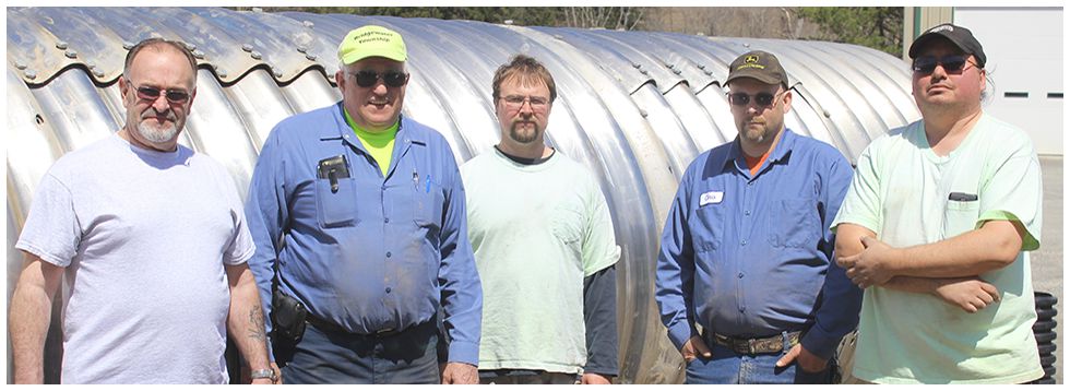5 guy workers posing for a photo